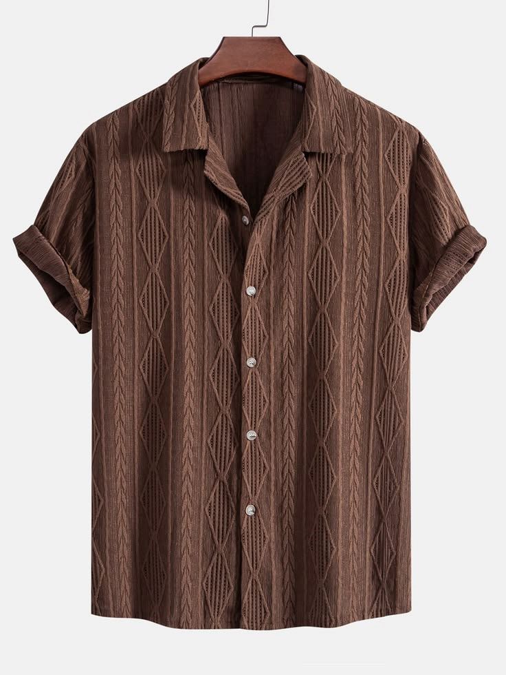 Brown textured short-sleeve button-up shirt with a camp collar, featuring an intricate vertical geometric knit pattern and rolled sleeves.